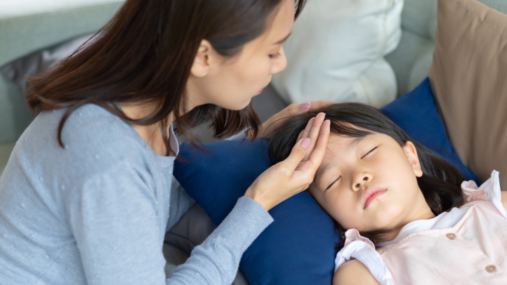 Mother near her daughter with migraine